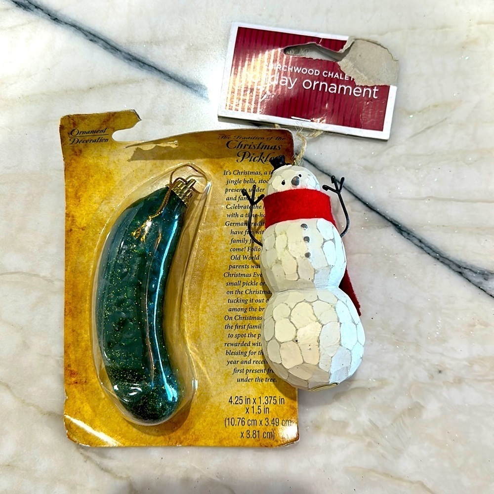 Christmas ornaments set up to new with tags Christmas snowman & Christmas pickle
